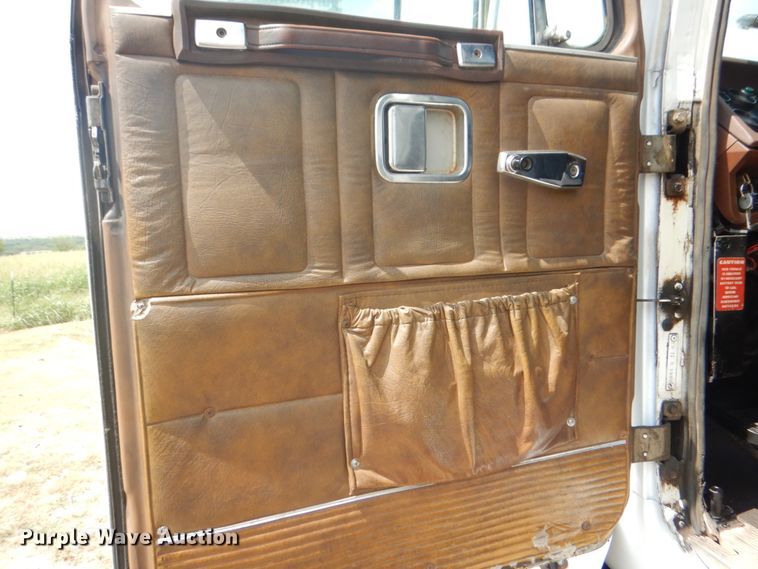 image for item DH7275 1980 White Road Boss  rollback truck