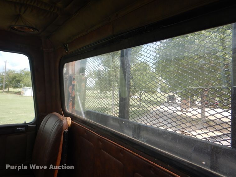 image for item DH7275 1980 White Road Boss  rollback truck