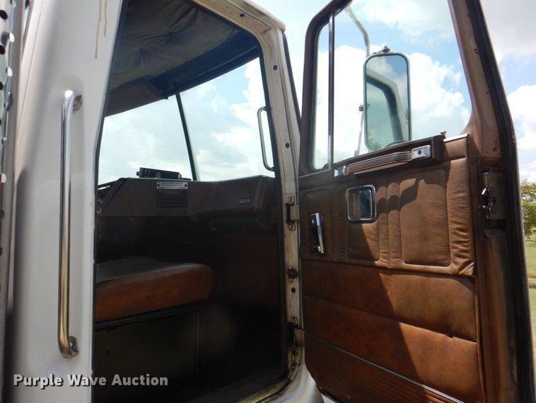 image for item DH7275 1980 White Road Boss  rollback truck