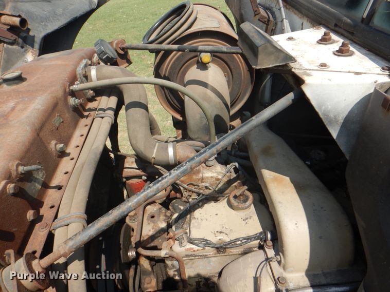 image for item DH7275 1980 White Road Boss  rollback truck