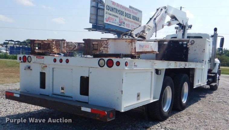 image for item HT9416 2006 International 7400  crane truck with tire grapple