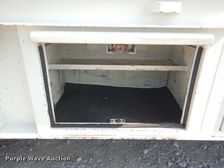 image for item HT9416 2006 International 7400  crane truck with tire grapple