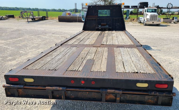 image for item IU9295 2001 International 4700  hydratail flatbed truck