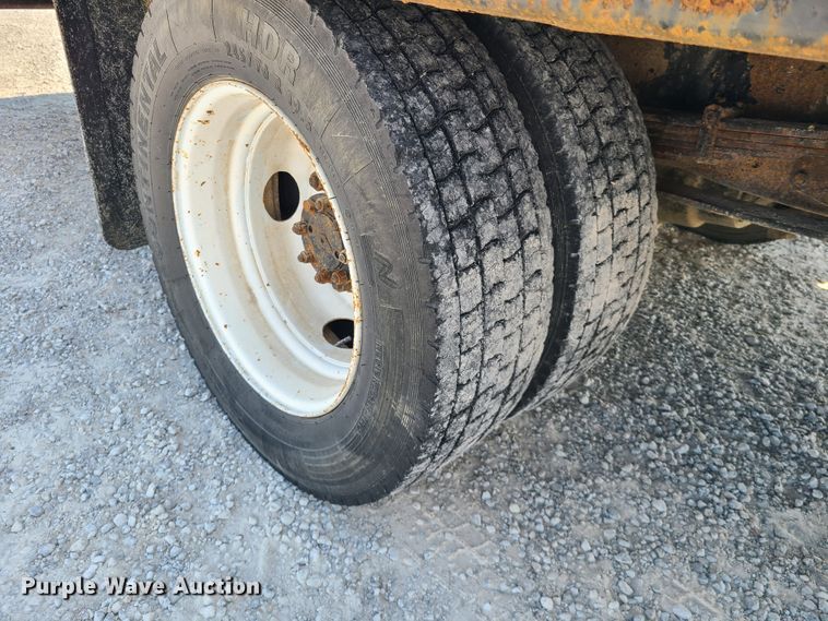 image for item IU9295 2001 International 4700  hydratail flatbed truck