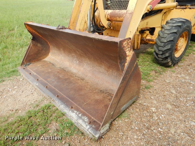 image for item DM3967 1997 John Deere 310E  backhoe