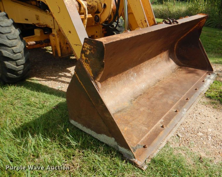 image for item DM3967 1997 John Deere 310E  backhoe