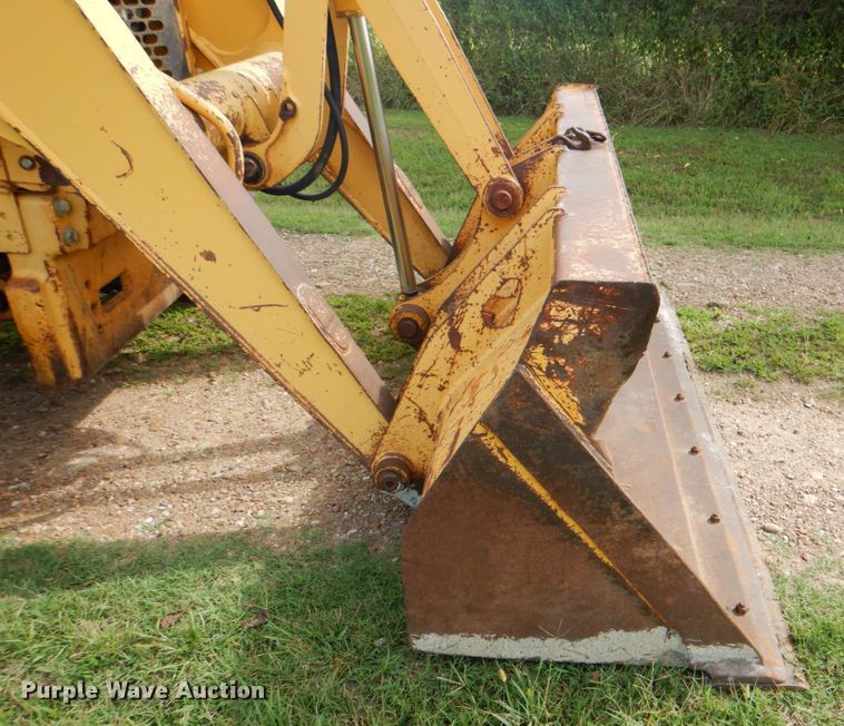 image for item DM3967 1997 John Deere 310E  backhoe