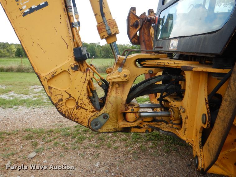 image for item DM3967 1997 John Deere 310E  backhoe