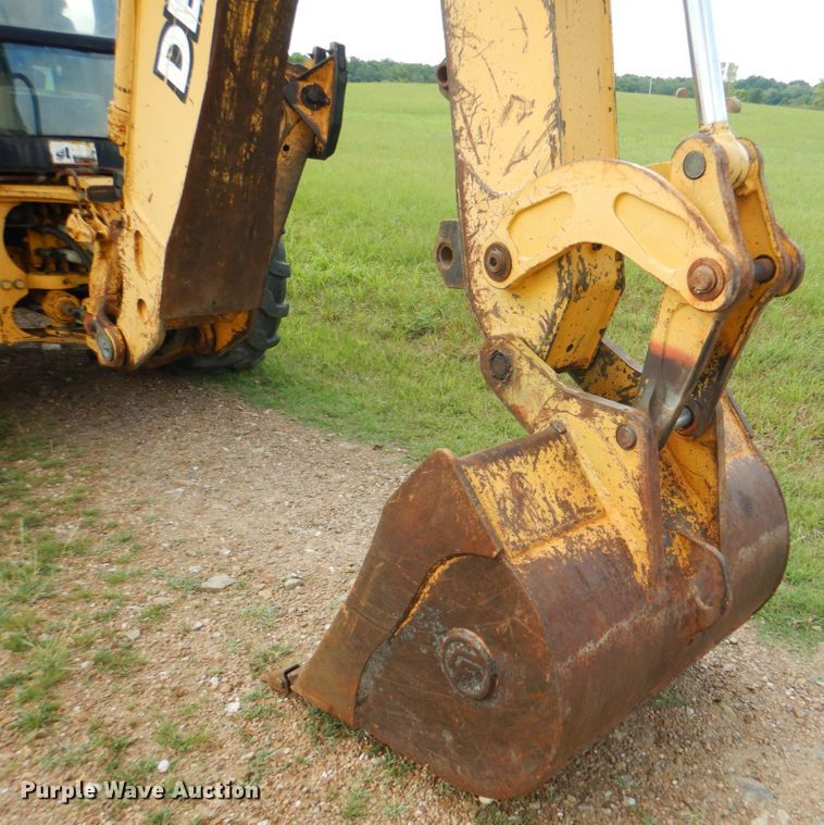 image for item DM3967 1997 John Deere 310E  backhoe