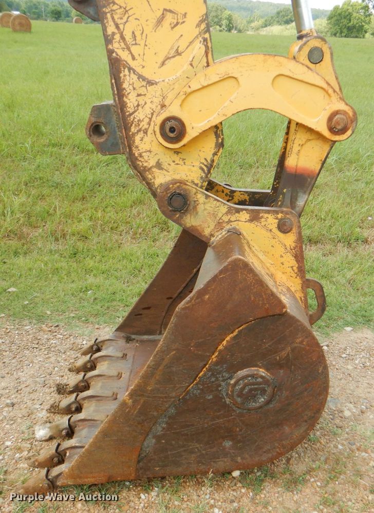 image for item DM3967 1997 John Deere 310E  backhoe