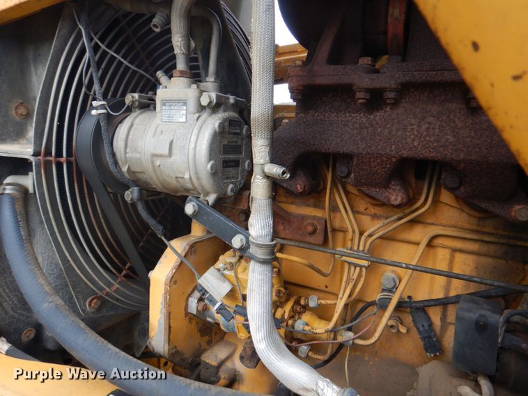 image for item DM3967 1997 John Deere 310E  backhoe