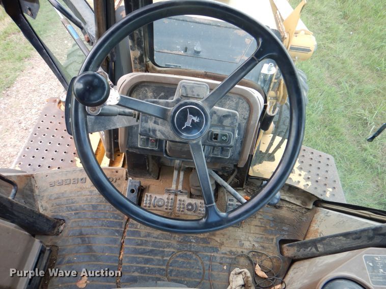 image for item DM3967 1997 John Deere 310E  backhoe