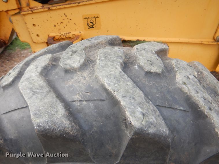 image for item DM3967 1997 John Deere 310E  backhoe