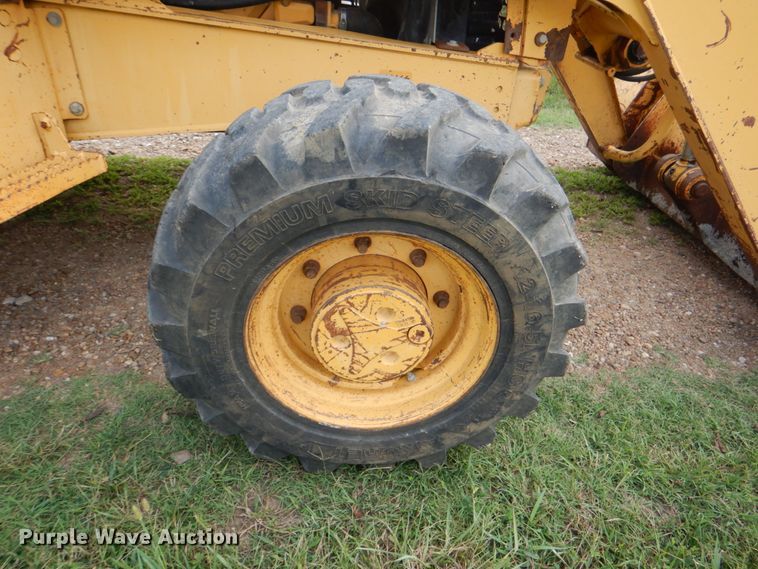 image for item DM3967 1997 John Deere 310E  backhoe