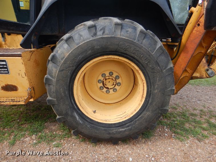 image for item DM3967 1997 John Deere 310E  backhoe