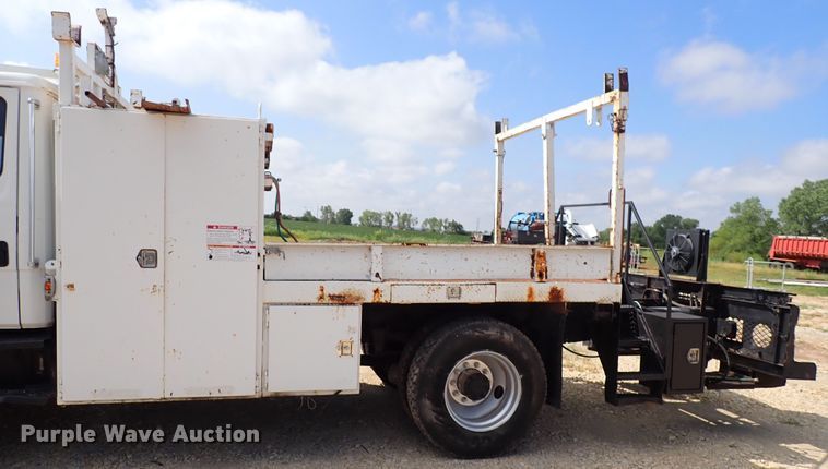 image for item DM5007 1999 Freightliner FL70  Crew Cab utility/service truck