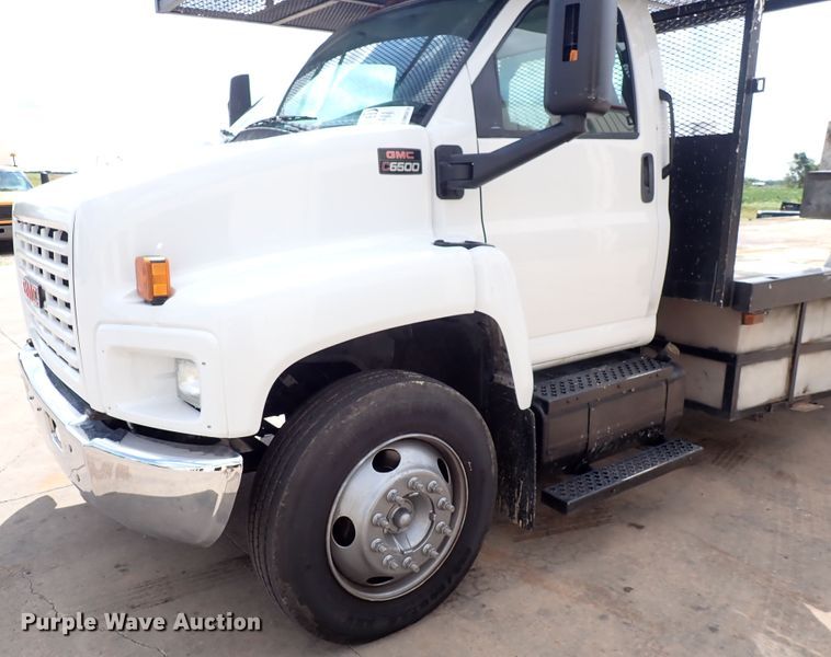 image for item DM5018 2005 GMC C6500  flatbed truck