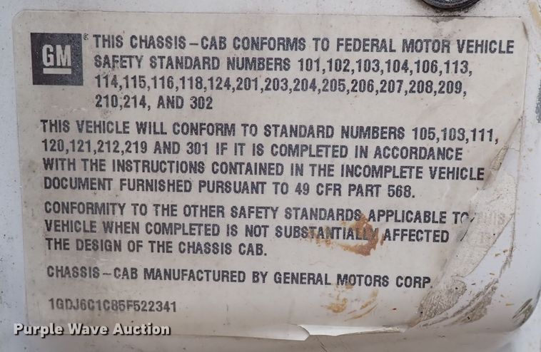 image for item DM5018 2005 GMC C6500  flatbed truck