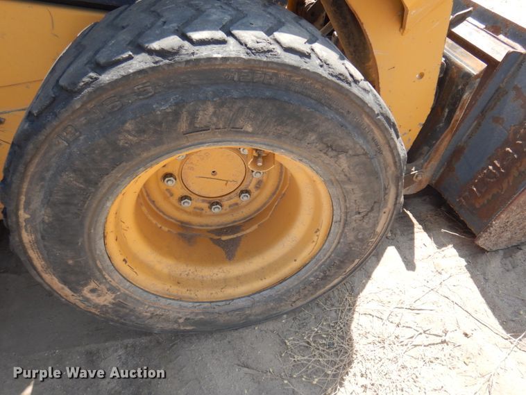 image for item IP9530 2014 Caterpillar 236D  skid steer loader