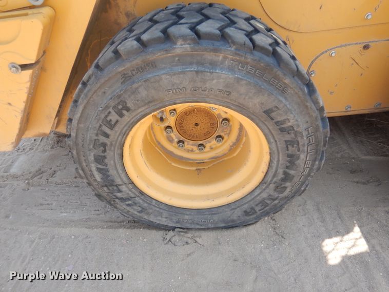 image for item IP9530 2014 Caterpillar 236D  skid steer loader