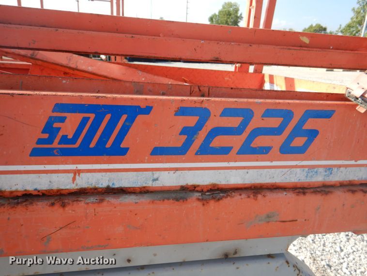 image for item KW9793 2000 Skyjack SJIII 3226  scissor lift