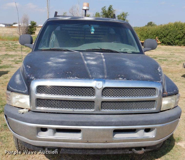 image for item DK8169 1999 Dodge Ram 1500  Club Cab flatbed pickup truck