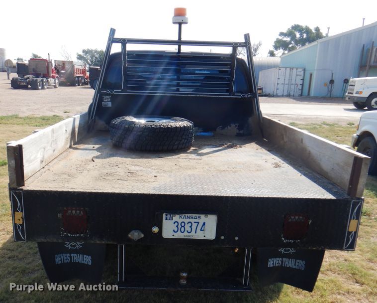 image for item DK8169 1999 Dodge Ram 1500  Club Cab flatbed pickup truck