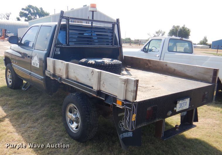 image for item DK8169 1999 Dodge Ram 1500  Club Cab flatbed pickup truck