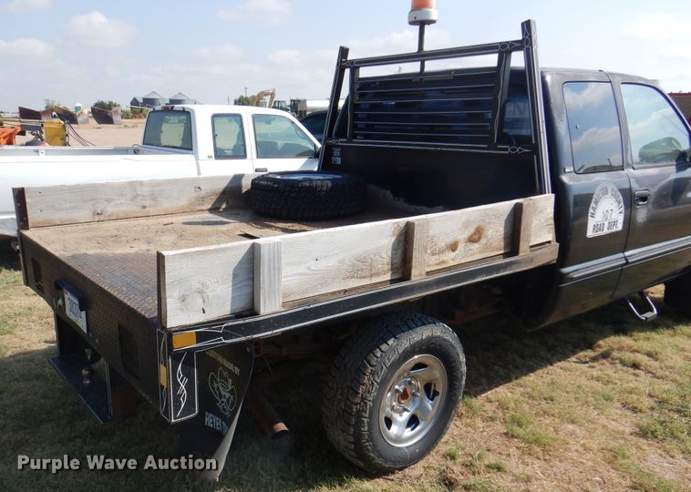 image for item DK8169 1999 Dodge Ram 1500  Club Cab flatbed pickup truck