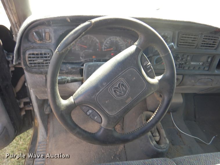 image for item DK8169 1999 Dodge Ram 1500  Club Cab flatbed pickup truck