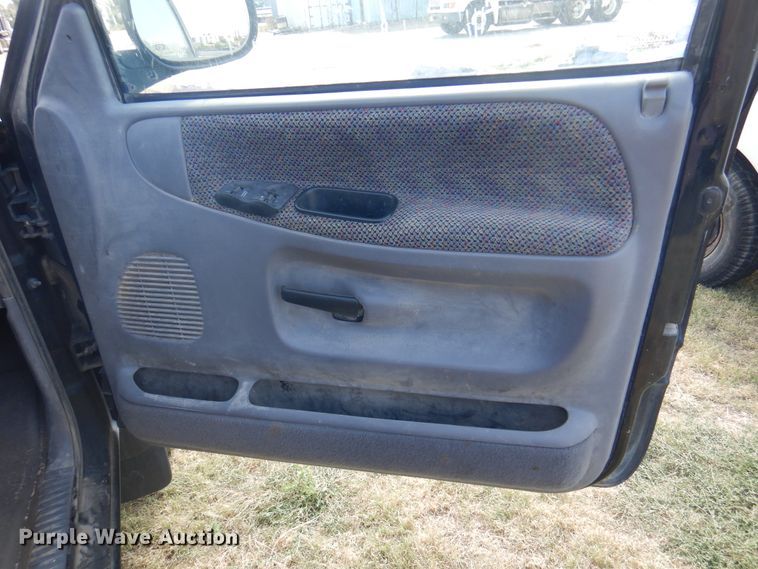 image for item DK8169 1999 Dodge Ram 1500  Club Cab flatbed pickup truck