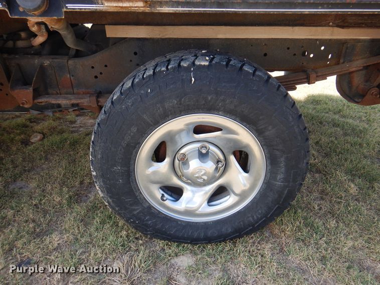 image for item DK8169 1999 Dodge Ram 1500  Club Cab flatbed pickup truck