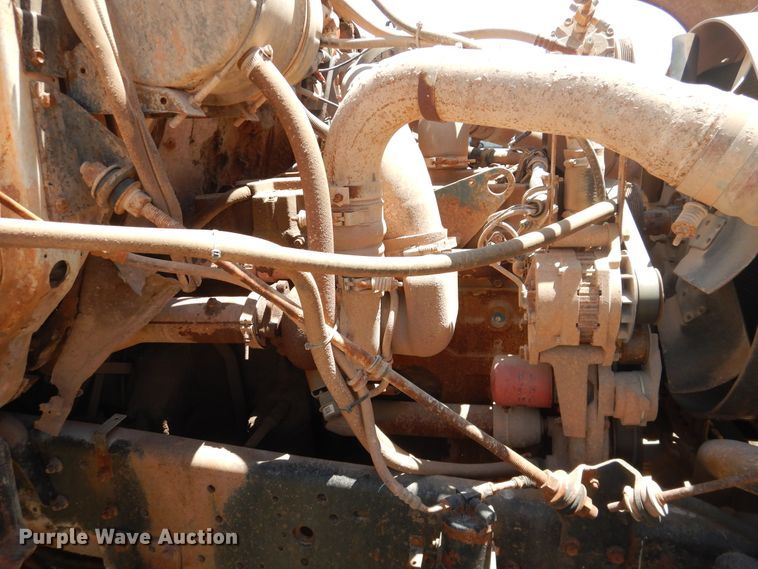 image for item DL0375 1997 International 2554  roll-off container truck