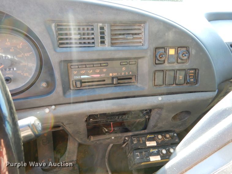 image for item DM1365 1998 GMC C7500  street sweeper truck