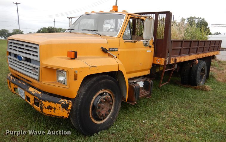 image for item IN9888 1985 Ford F700  dump flatbed truck