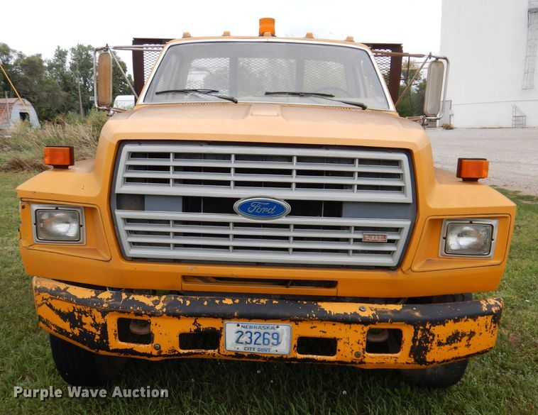 image for item IN9888 1985 Ford F700  dump flatbed truck