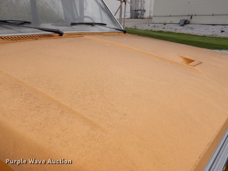 image for item IN9888 1985 Ford F700  dump flatbed truck