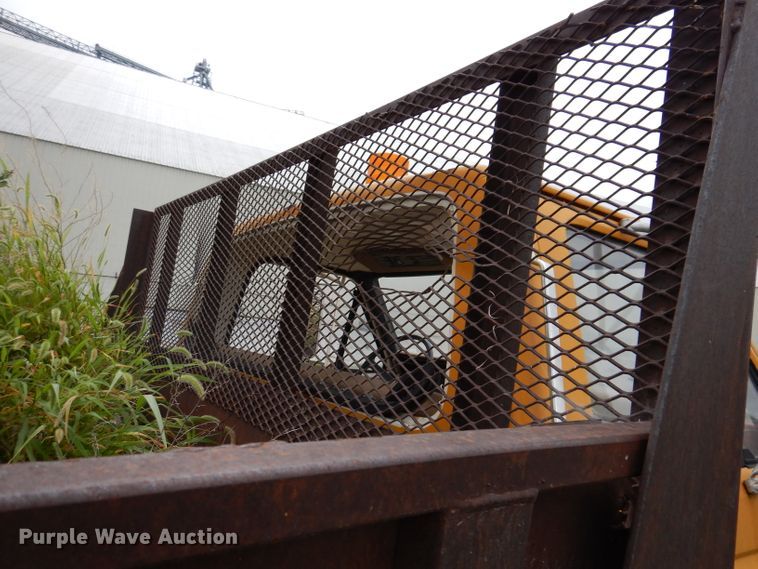 image for item IN9888 1985 Ford F700  dump flatbed truck