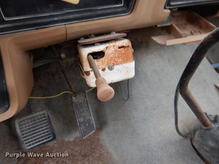 image for item IN9888 1985 Ford F700  dump flatbed truck