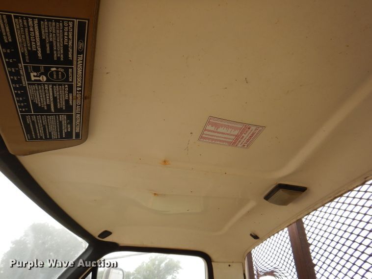 image for item IN9888 1985 Ford F700  dump flatbed truck