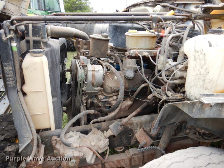 image for item IN9888 1985 Ford F700  dump flatbed truck