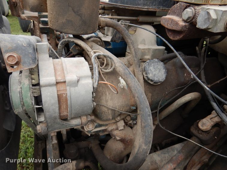 image for item IN9888 1985 Ford F700  dump flatbed truck