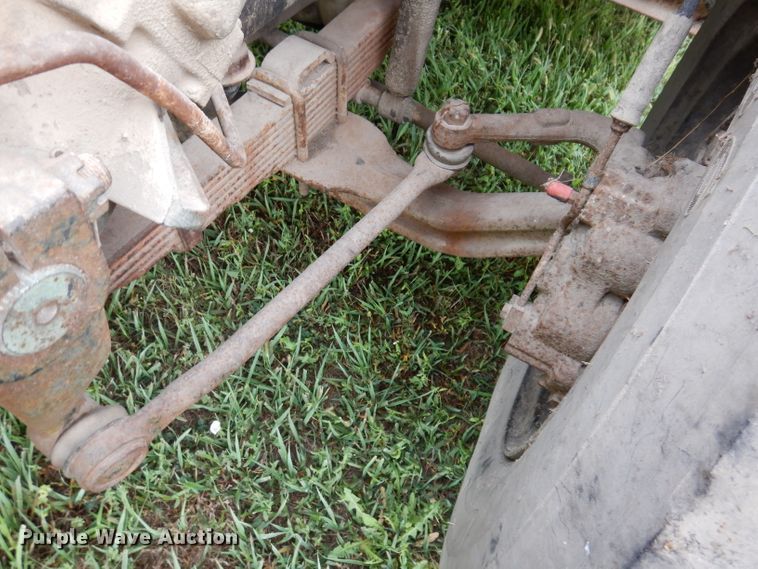 image for item IN9888 1985 Ford F700  dump flatbed truck