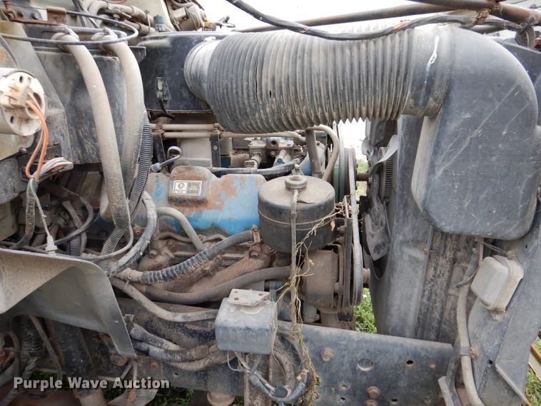 image for item IN9888 1985 Ford F700  dump flatbed truck