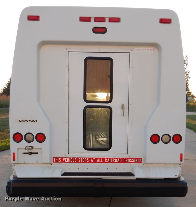 image for item IN9906 2010 Ford E450  shuttle bus