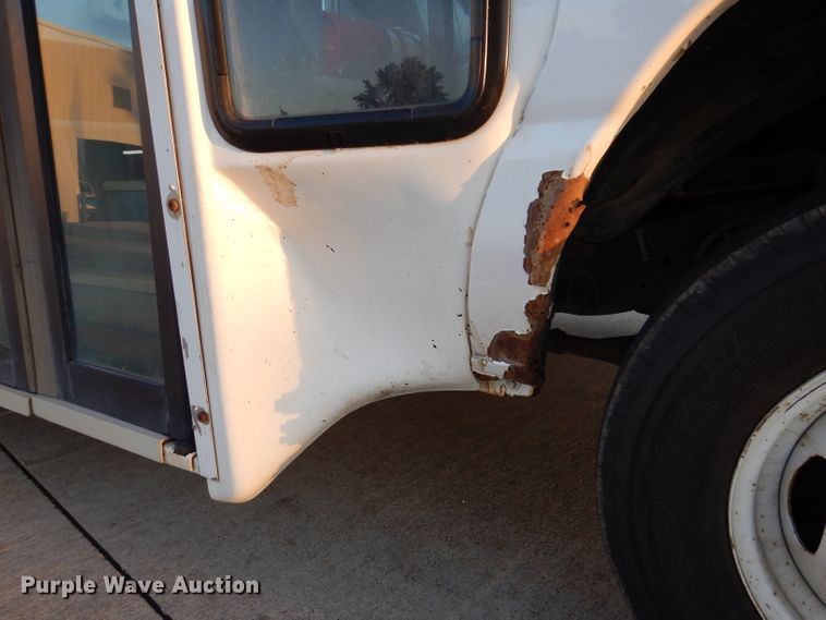 image for item IN9906 2010 Ford E450  shuttle bus