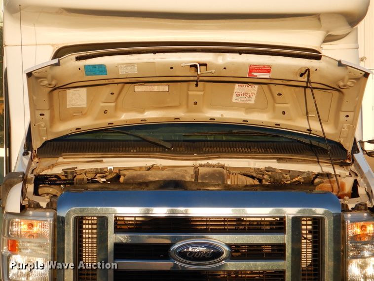 image for item IN9906 2010 Ford E450  shuttle bus