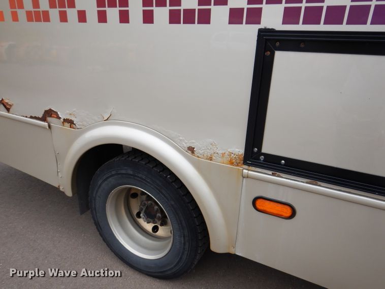 image for item IN9927 2010 Ford F650  shuttle bus