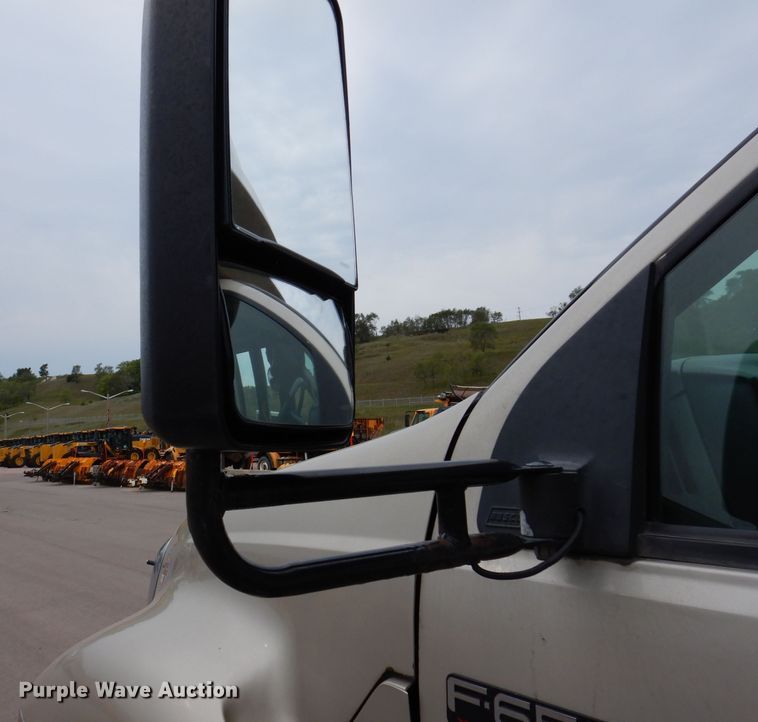 image for item IN9927 2010 Ford F650  shuttle bus