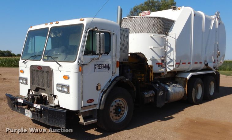 image for item KV9219 2014 Peterbilt 320  refuse truck